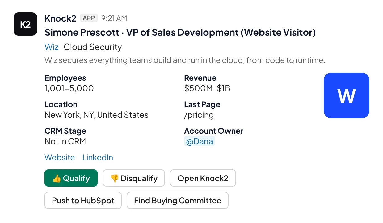 A Knock2 alert in Slack: the visitor, their company, last page and account owner, with Qualify, Disqualify and Push to HubSpot buttons